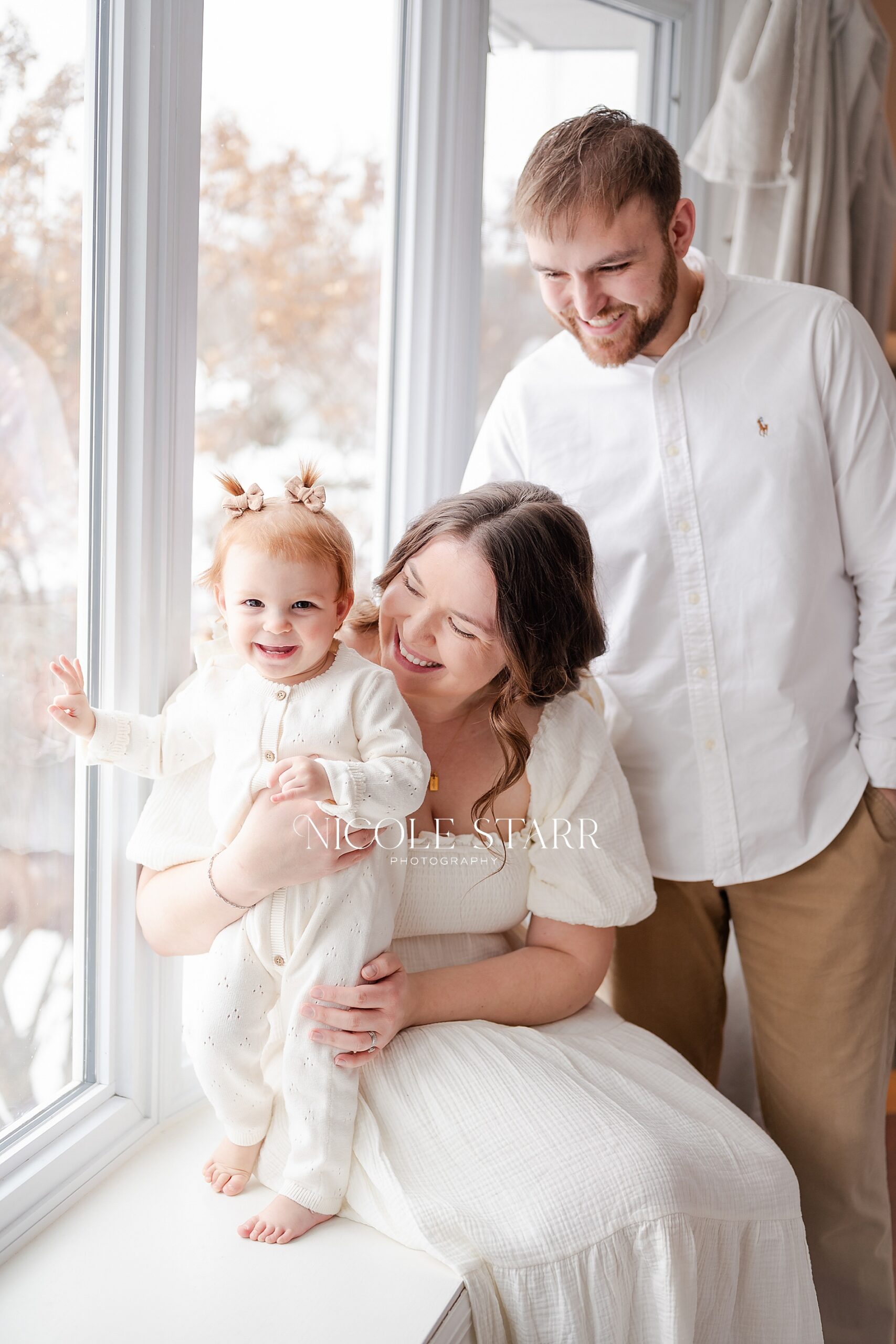 cozy family portraits at home with a toddler