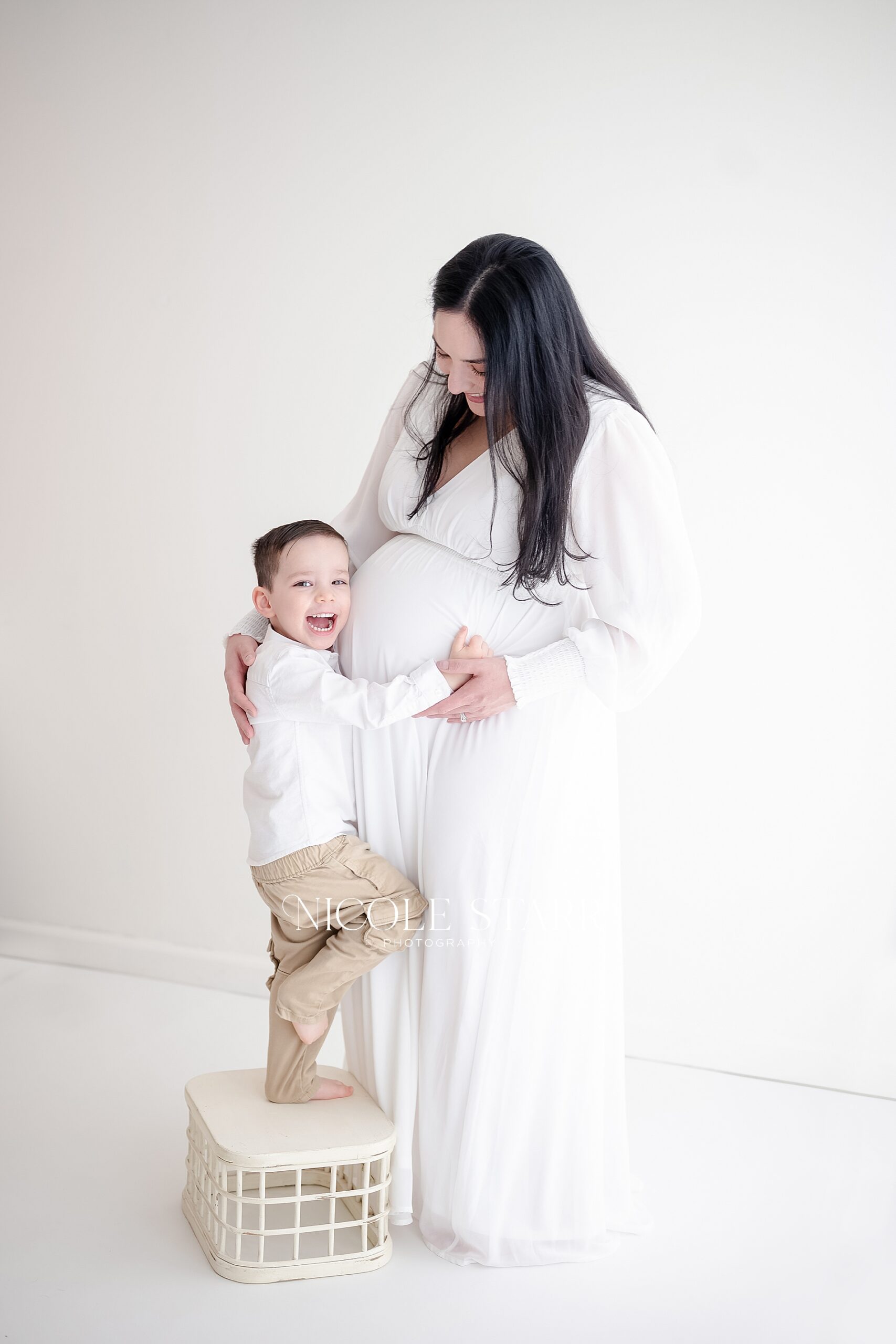pregnant mom with her toddler son during maternity session