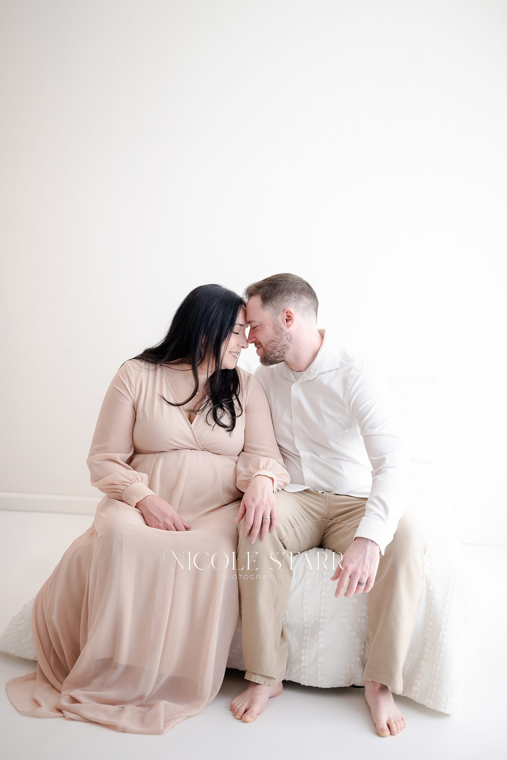 expectant parents during maternity session in Saratoga Springs