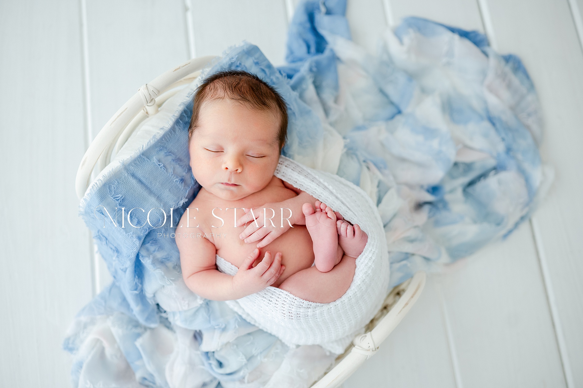 sleepy newborn from Soft Blue Newborn Session in Saratoga Spring Studio
