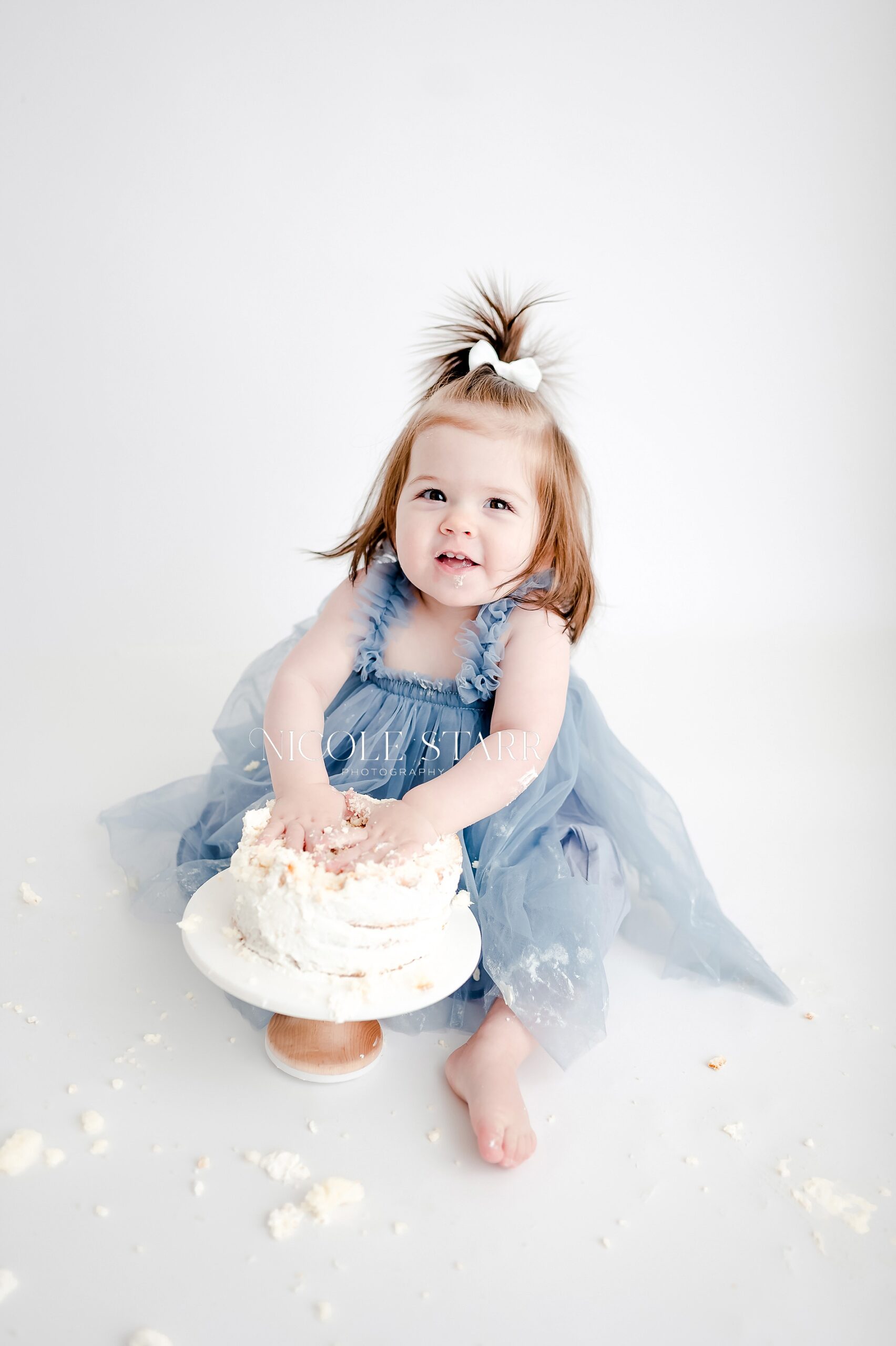 The Beauty of a Simple Cake Smash Session for First Birthdays