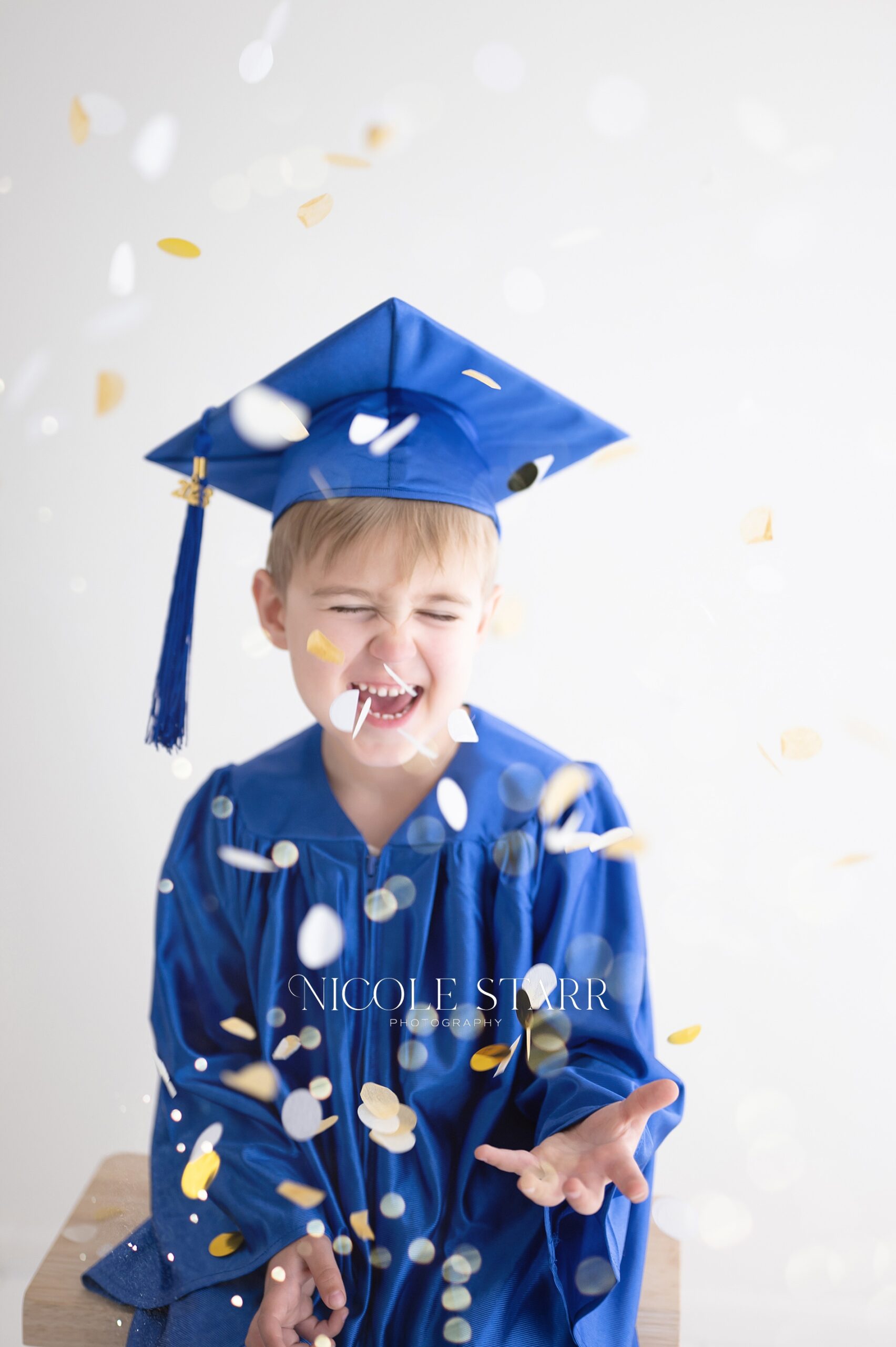 cap and gown portraits for kindergartner