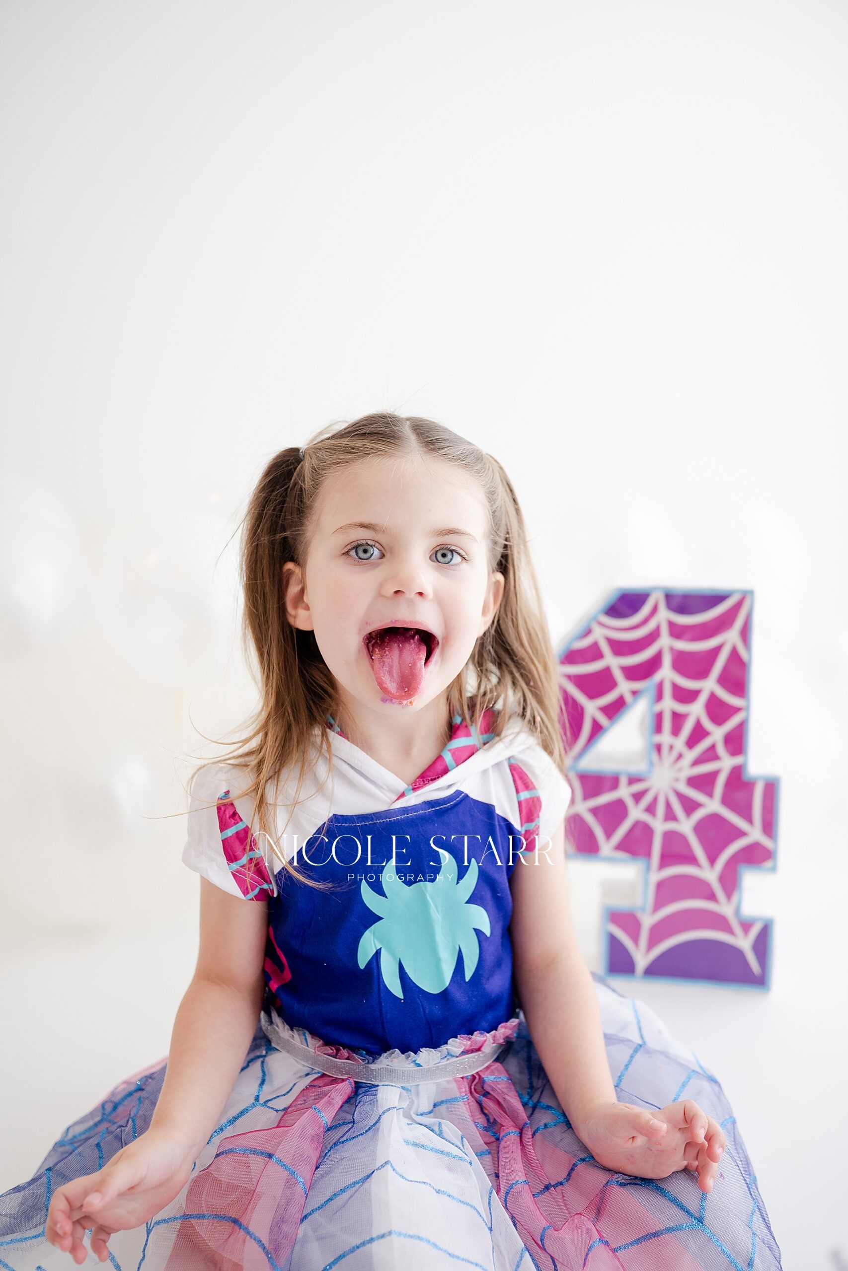 4 year old girl during A Ghost Spider Cake Smash
