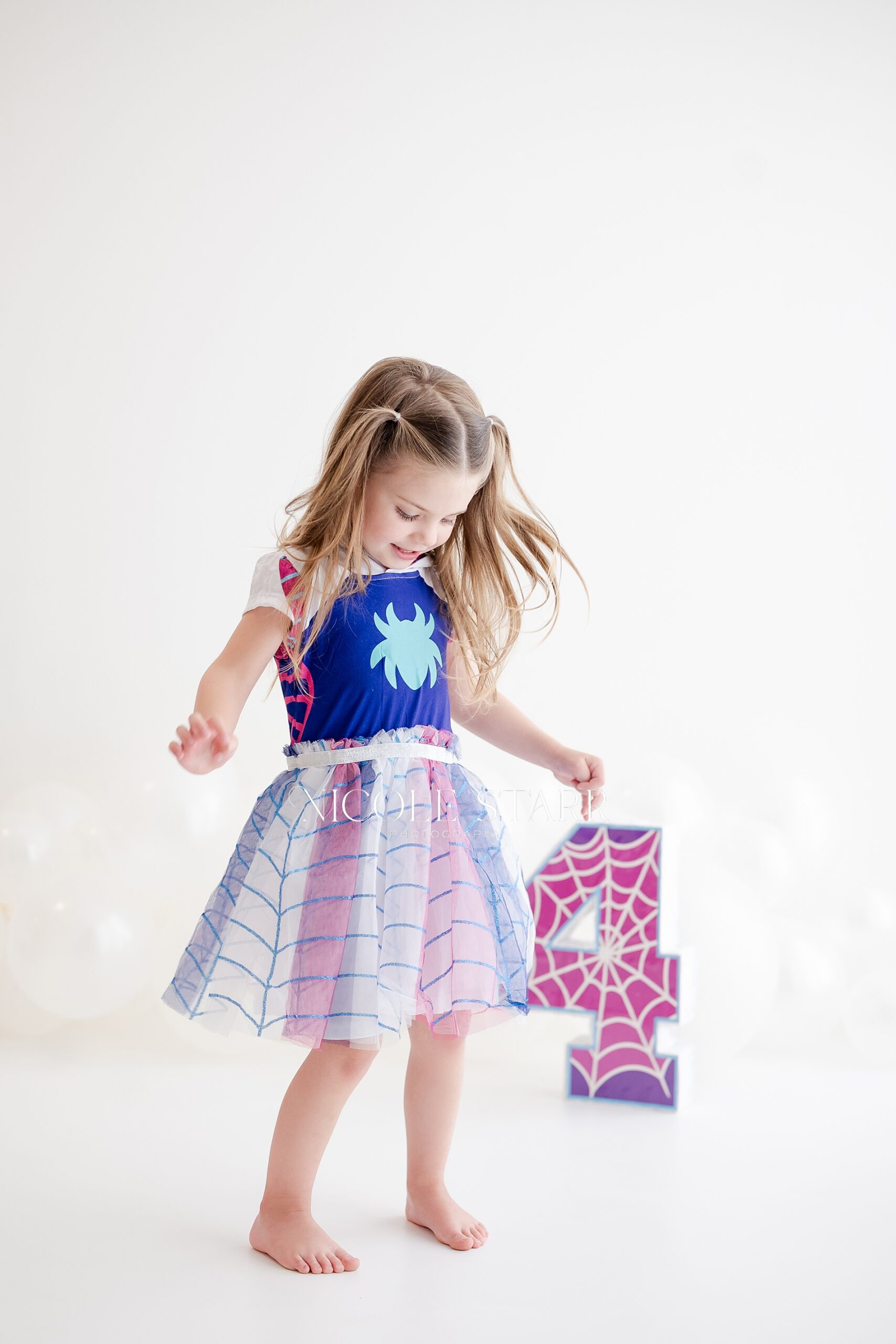 candid milestone portraits of little girl dancing