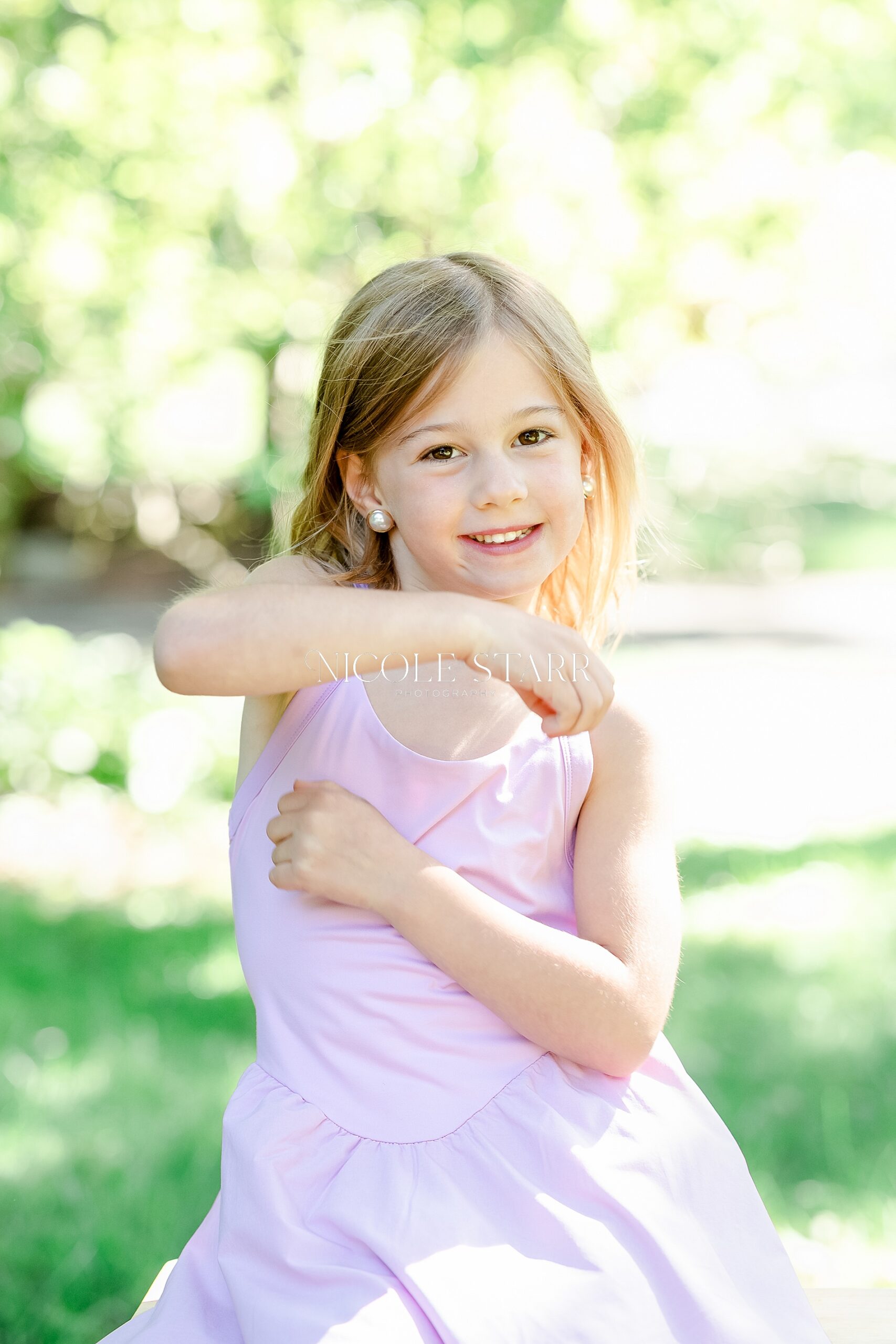 Timeless Children's portraits of little girl in pink dress