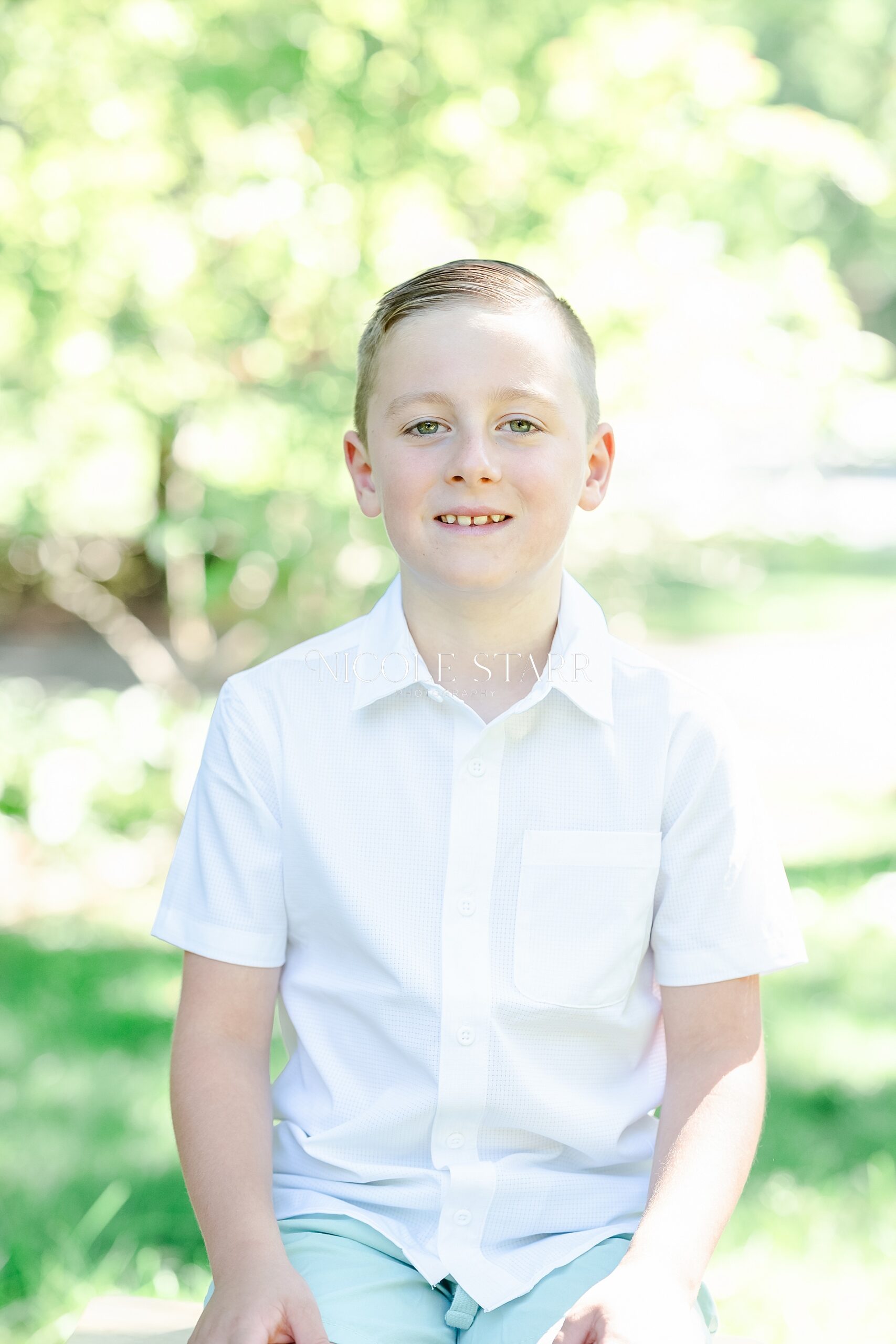 young boy in white shirt for children's portraits