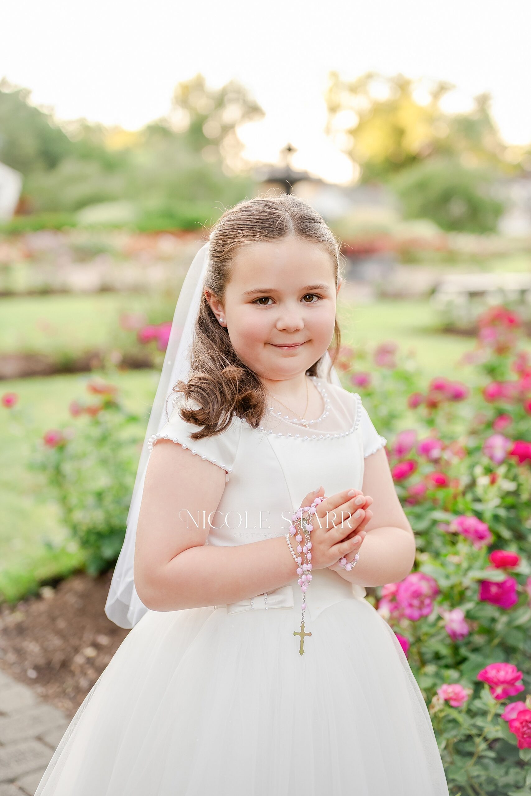 First Communion Portraits In a Rose Garden