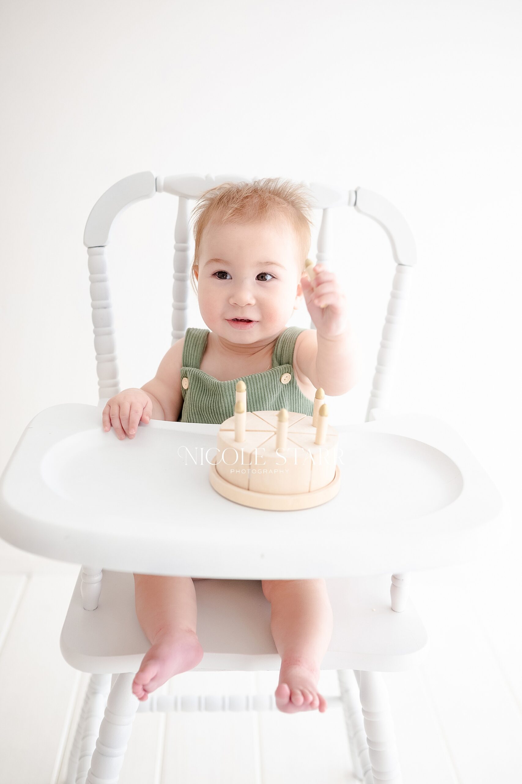 little boy in high chair