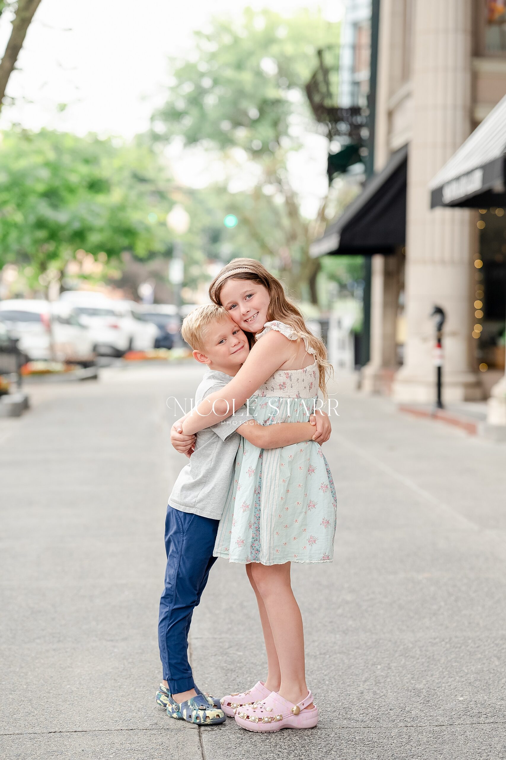 siblings hug each other