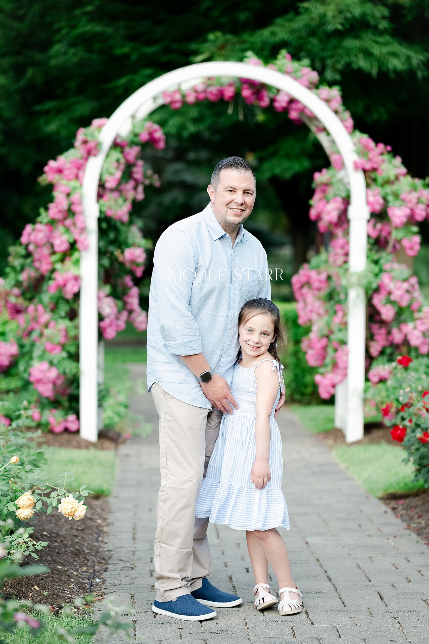 daddy-daughter portraits in rose garden