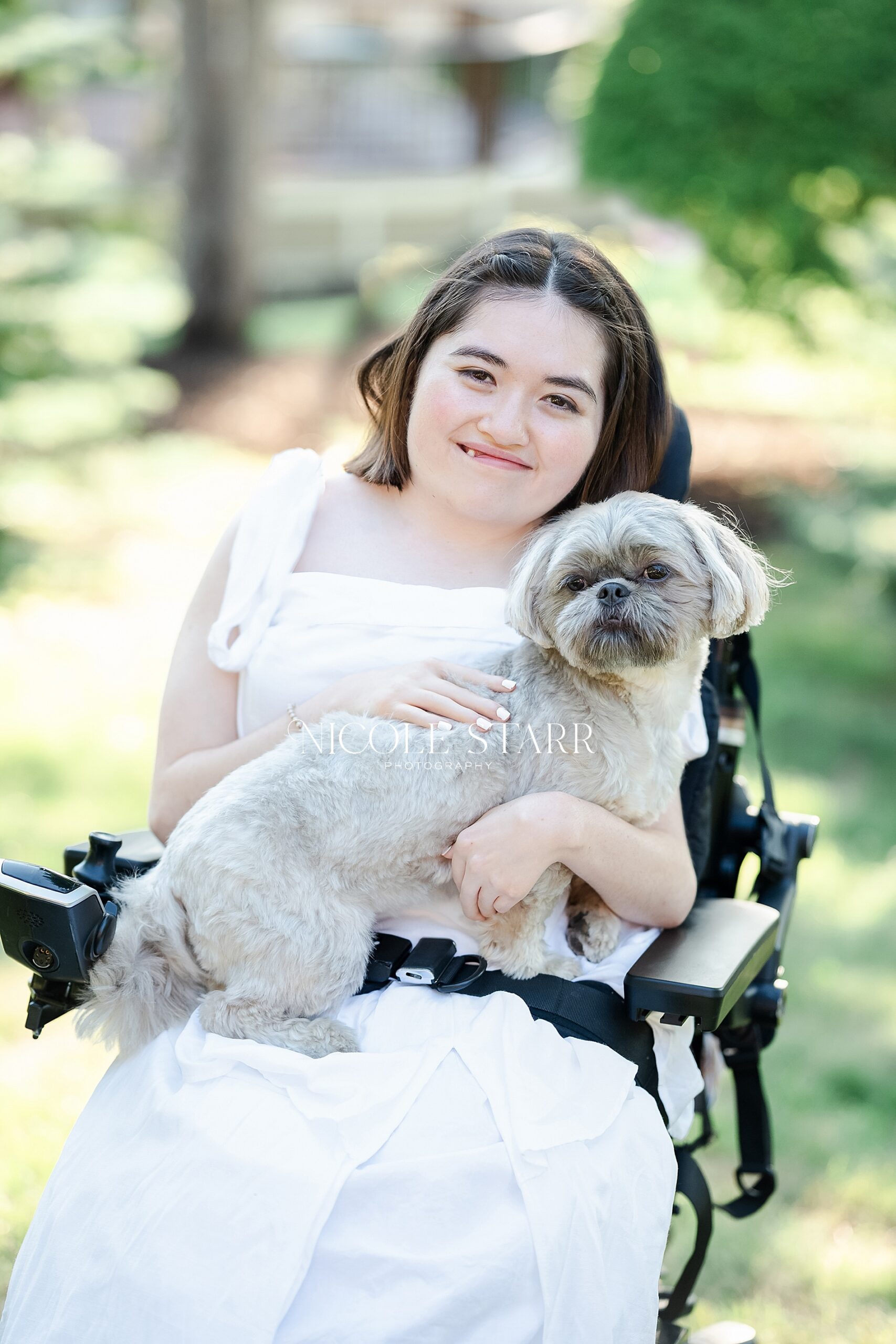 teenager holding dog