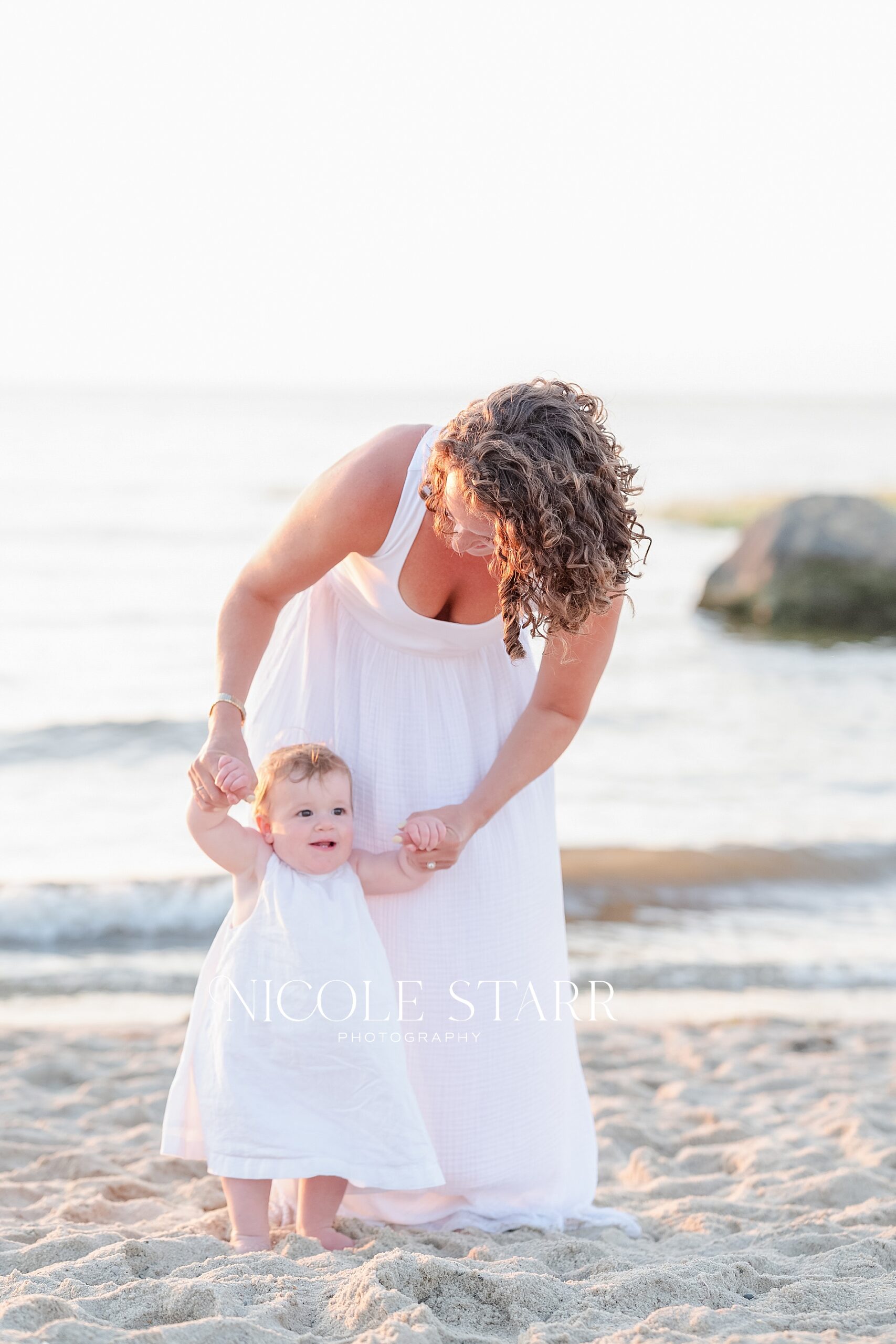 mother and daughter on the beach in Cape Cod
